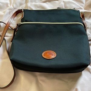 Dooney & Bourke black cross body bag with brown leather trim/strap